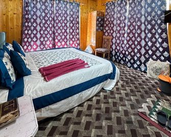 Munshi's Hotel and Restaurant(Tangmarg) - Gulmarg - Спальня