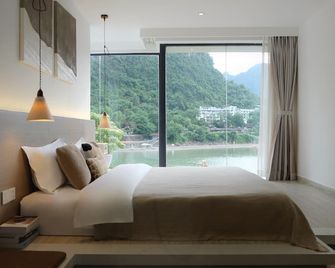 Ruoli Yangshuo - Guilin - Bedroom