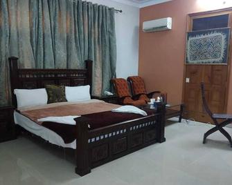 Hotel Orash Lodge - Muzaffarabad - Bedroom