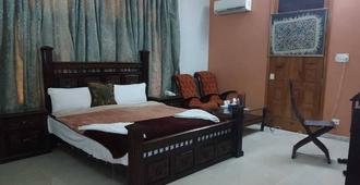 Hotel Orash Lodge - Muzaffarabad - Bedroom