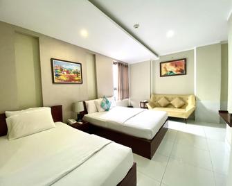 Mi Linh Hotel - הו צ'י מין סיטי - חדר שינה