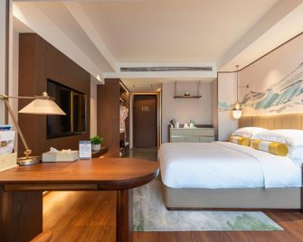 Yilite Hotel - אורומצ'י - חדר שינה