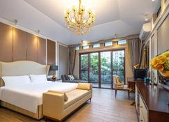 Jizhu Holiday Apartment (Hainan University City People's Hospital) - Haikou - Bedroom