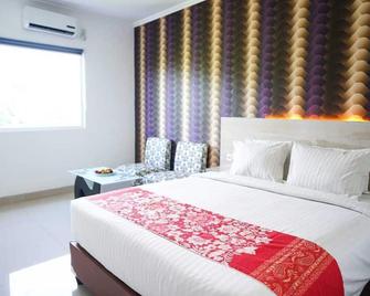 Mel's Inn Manado - Manado - Bedroom
