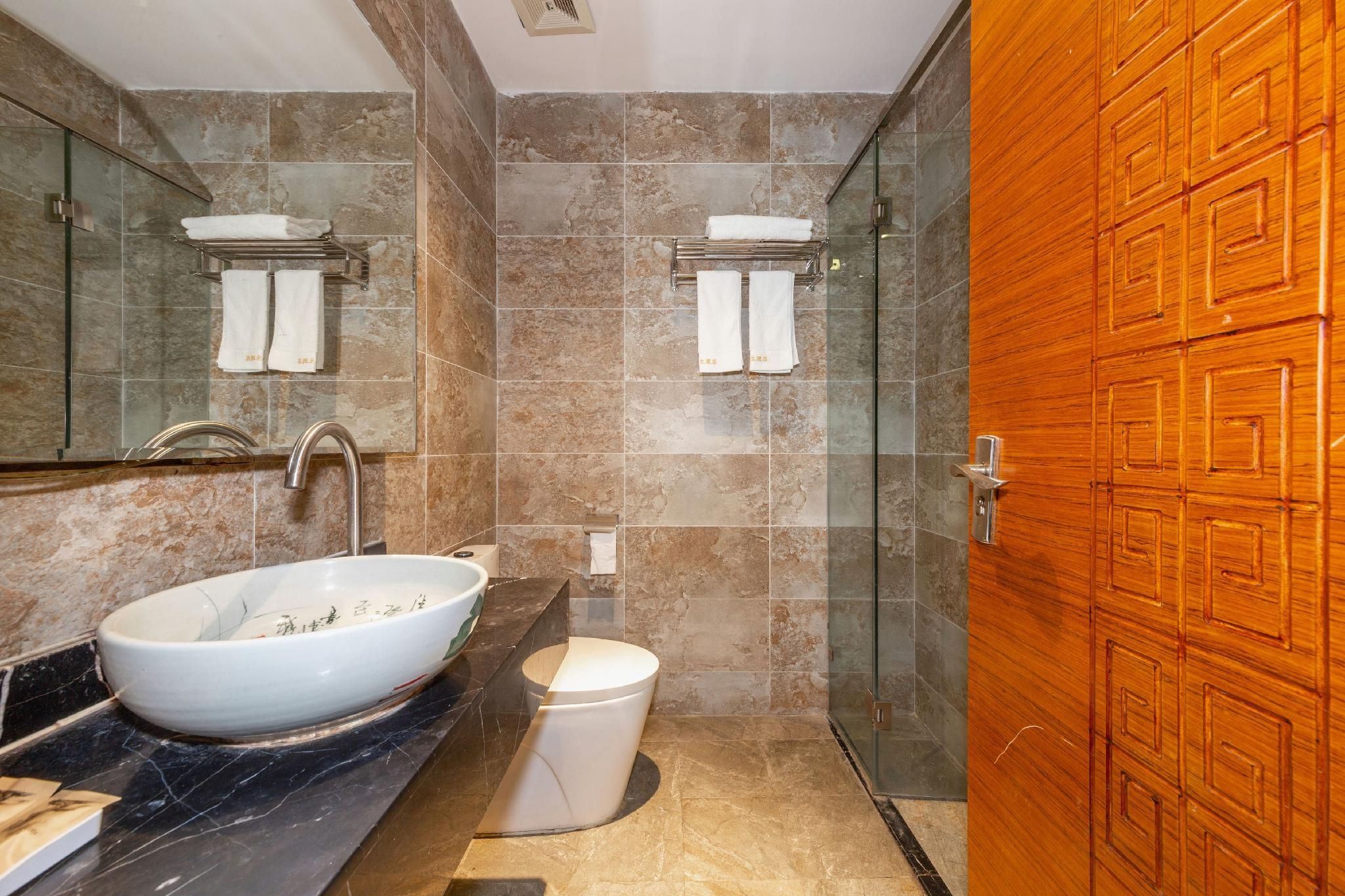 Jun Chen Health Hotel - גואנגג'ואו - חדר שינה