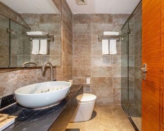 Jun Chen Health Hotel - גואנגג'ואו - חדר שינה