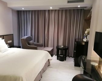 Ramada by Wyndham Meizhou - Meizhou - Bedroom