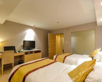 Taizhou Nanyuan Business Hotel - Taizhou - Habitación