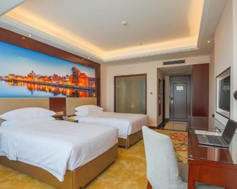 Vienna International Hotel Sichuan Leshan Giant Buddha - Leshan - Bedroom