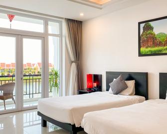 Riverside White House Hotel - Hoi An - Bedroom