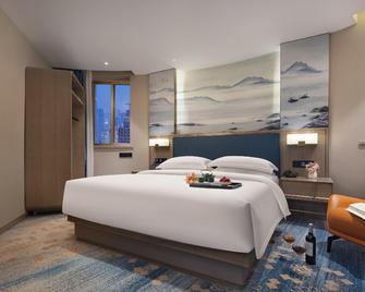 Guomao Grand Hotel - וונז'ו - חדר שינה