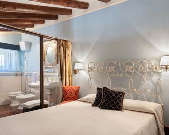 Relais Briuccia e Ristorante Capitolo Primo - Montallegro - Habitación