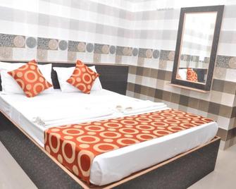 Addhuri Comforts Inn - Mysore - Habitación