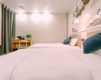 Qingmu Chain Hotel (Ma'anshan Lake Xi'nan Road Branch) - Ma'anshan - Habitación