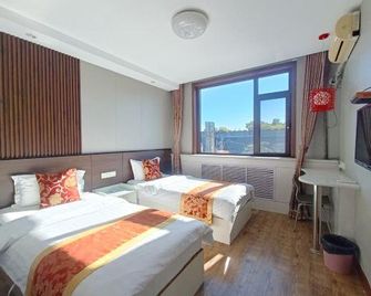Qufu Ancient City Hotel (Sankong Scenic Area) - Jining - Slaapkamer