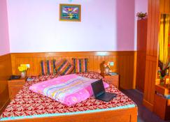 Aditya Home Stay - Shimla - Κρεβατοκάμαρα