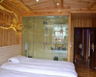 Xiongdi Renjia Diaojiaolou Inn - Xiangxi - Bedroom