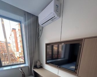 Jiayi Business Express Hotel - Yanbian - Bedroom