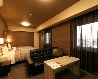 Hotel Route Inn Shinshiro - Shinshiro - Schlafzimmer