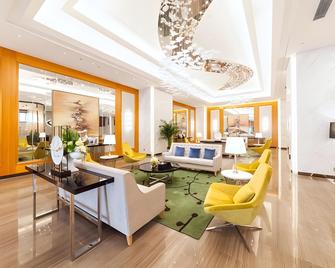 Suisse Place Apartment Hotel Taizhou Medical City - Tchaj-čou - Salónek