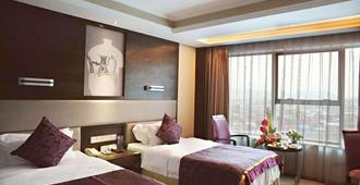 Yiwu Yimei Plaza Hotel - ז'ינהואה - חדר שינה