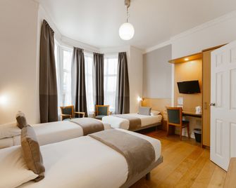 ستار هوتل - لندن - غرفة نوم