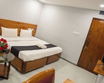 Hotel Vaishnavi Classic - Secunderabad - Slaapkamer