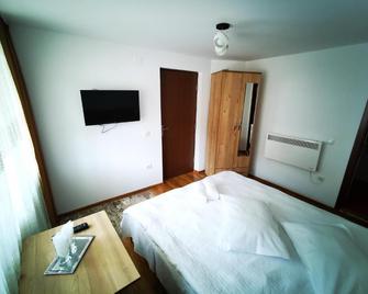 Pensiunea La Ionica - Dâmbovicioara - Bedroom