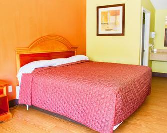 Tropicana Motel - Bastrop - Bedroom