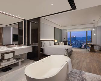 Wyndham Grand Lishui Downtown - Lishui - Спальня