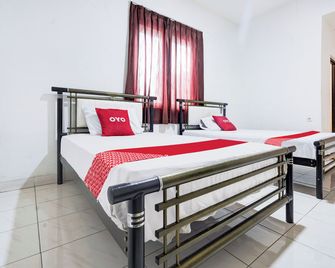 Hotel O Rappocini Near Rsia Paramount - Makassar - Bedroom