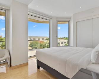 Luxury Beach 2BR Condo w/ Ocean View at Coral by Bocobay - Paradera - Slaapkamer
