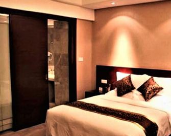 Junshanhu International Hotel - נאנצ'אנג - חדר שינה