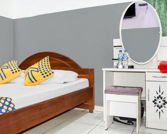 Hotel O Penginapan Widodo - Samarinda - Ložnice