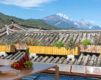 Lijiang Phoenix Health Resort Hotel (Shuhe Ancient Town Branch) - Lijiang - Balcon