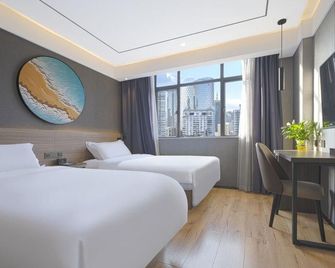 Elong Wanguo Hotel (Nanchang Railway Station Bayi Square) - נאנצ'אנג - חדר שינה