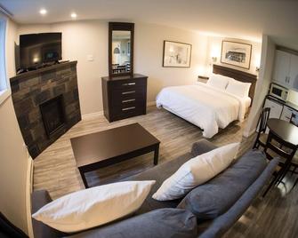 Le Montagnard, Hôtel, condos & chalets - Sutton - Habitación