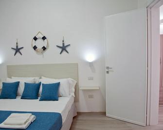 B&b Suddenna - Torre San Giovanni - Schlafzimmer