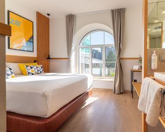 Sercotel El Balcón de la Bahía Suites - Santander - Schlafzimmer