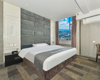 Twins International Apartment - Guiyang - Habitación