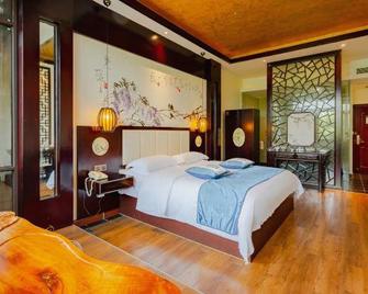 Lingxiu Impression Hotel (Emei Baoguoguo Temple) - Leshan - Bedroom