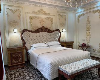 Lion Hotel - אסטנה - חדר שינה