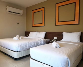 Ants Hotel - Kangar - Schlafzimmer
