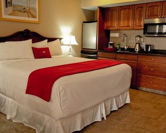 Lake Grassy Inn & Suites - Lake Placid - Ložnice