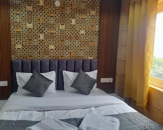 Hotel Asha Delight - Rishikesh - Makuuhuone