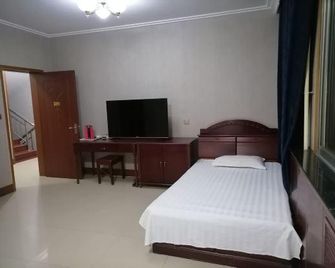 Longquan Hotel - Xinzhou - Bedroom