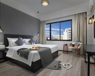 Wonder Land Hotel (Kunming Railway Station) - Kunming - Bedroom