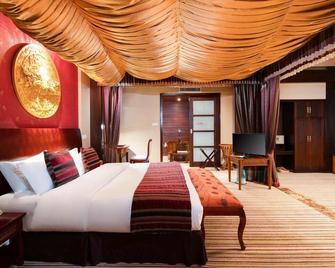 Shangri-La Paradise Hotel - Diqing - Bedroom