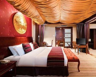 Shangri-La Paradise Hotel - Dêqên - Sovrum