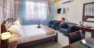 Mazubu grand hotel - Mbuguni - Bedroom